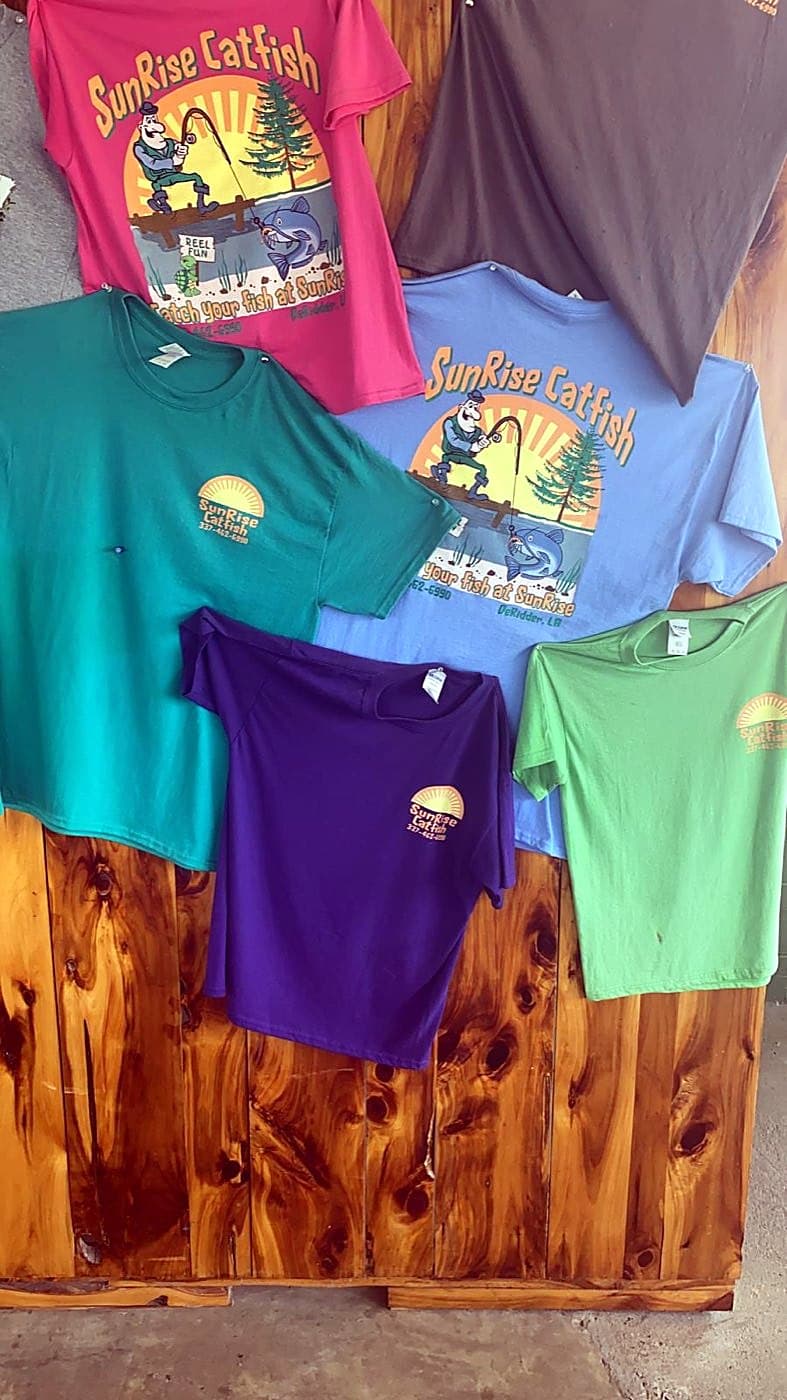 Colorful Sunrise Catfish t-shirts on display
